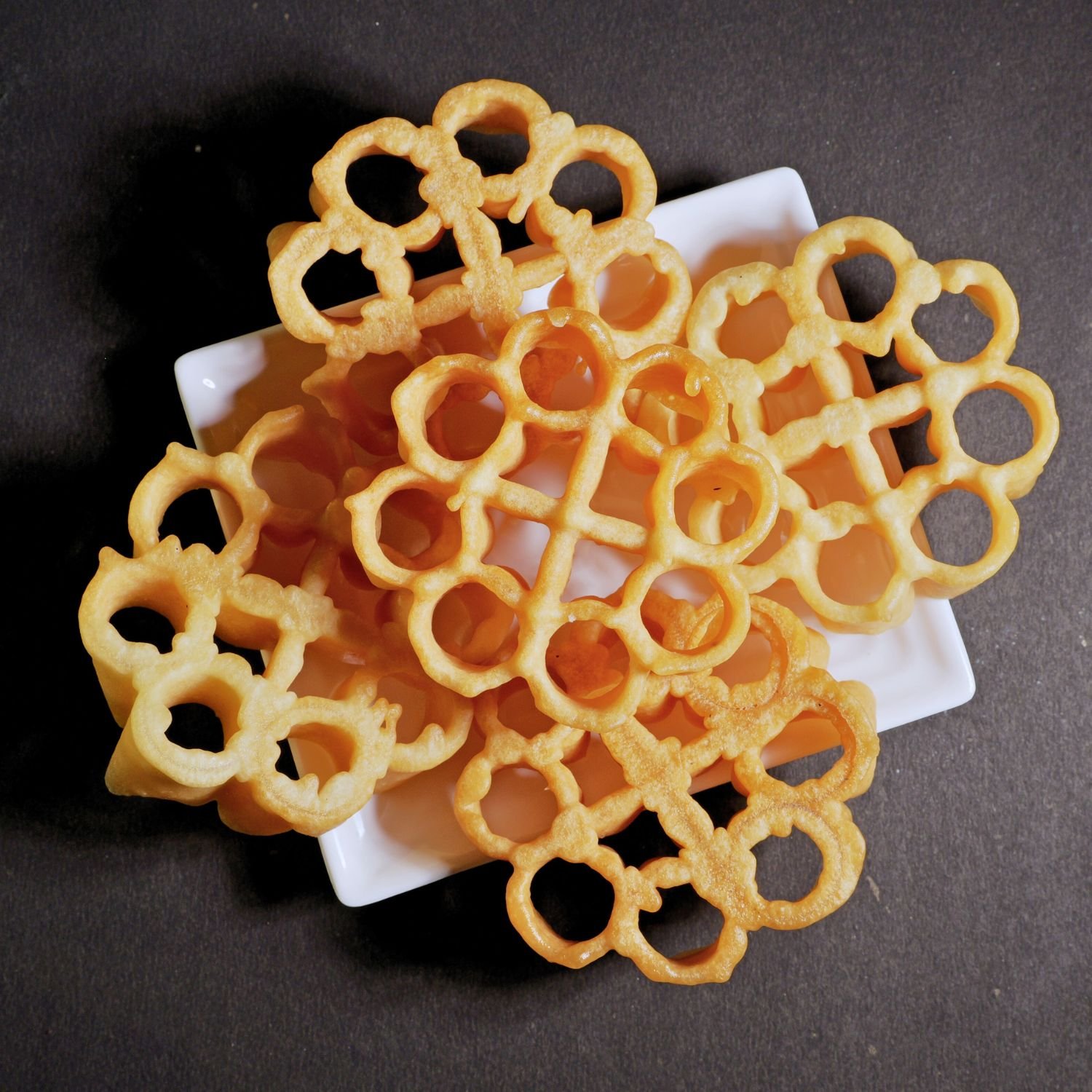 Crispy Achu Murukku – traditional rose cookie snack from Kovilpatti Murukku Kadai.