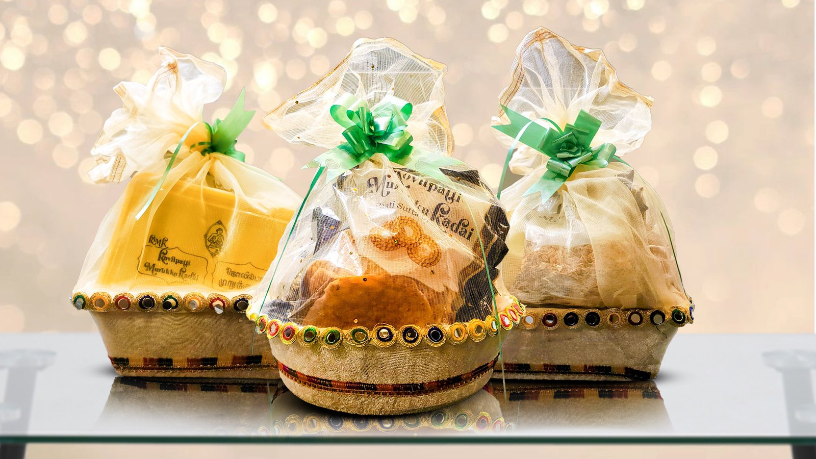 Premium gift hamper for corporate gifts featuring assorted Indian sweets and snacks